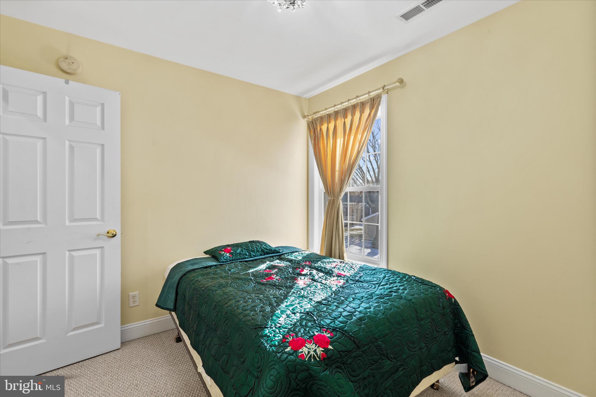 108 Franklin Avenue Berlin, MD 21811 - Photo 51 of 62 a bedroom with a bed and a window