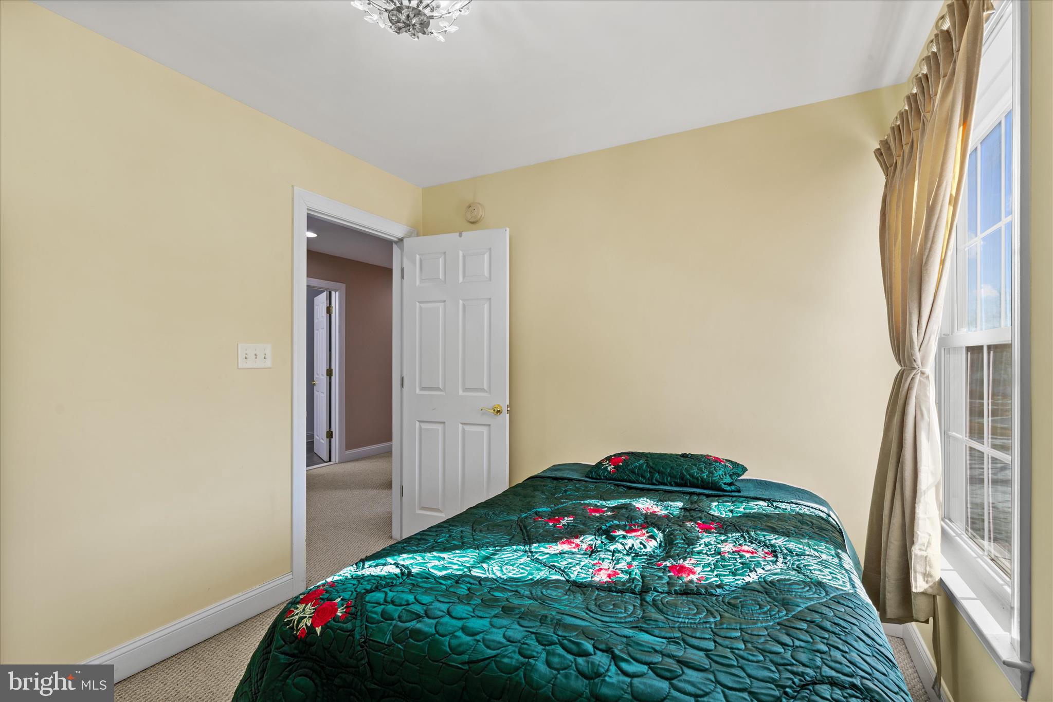 108 Franklin Avenue Berlin, MD 21811 - Photo 52 of 62 a bedroom with a bed and a window