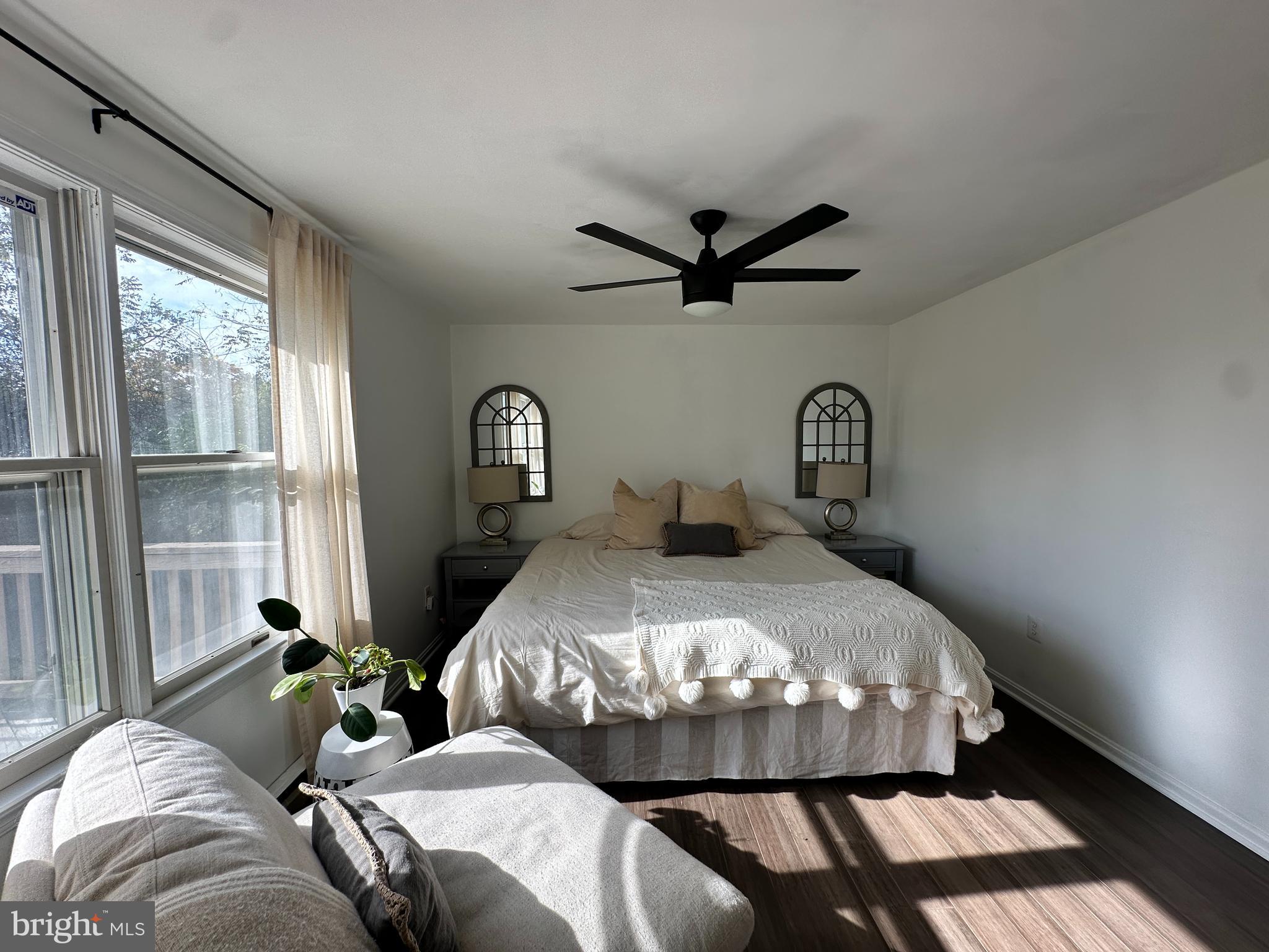 7601 Rudyard Street Falls Church, VA 22043 - Photo 14 of 29 a bed sitting in a bedroom next to a window