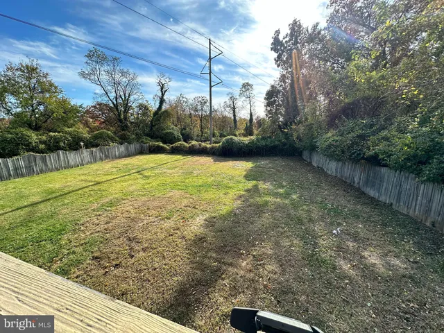 a view of a yard with an outdoor space