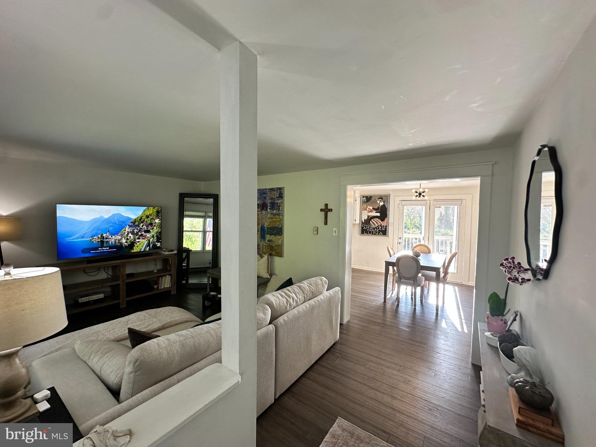 7601 Rudyard Street Falls Church, VA 22043 - Photo 4 of 29 a living room with furniture fireplace and flat screen tv