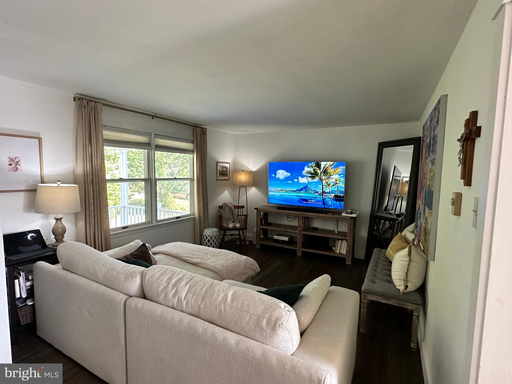 7601 Rudyard Street Falls Church, VA 22043 - Photo 5 of 29 a living room with furniture a window and a flat screen tv