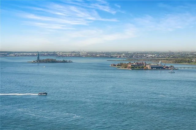 an aerial view of beach and city
