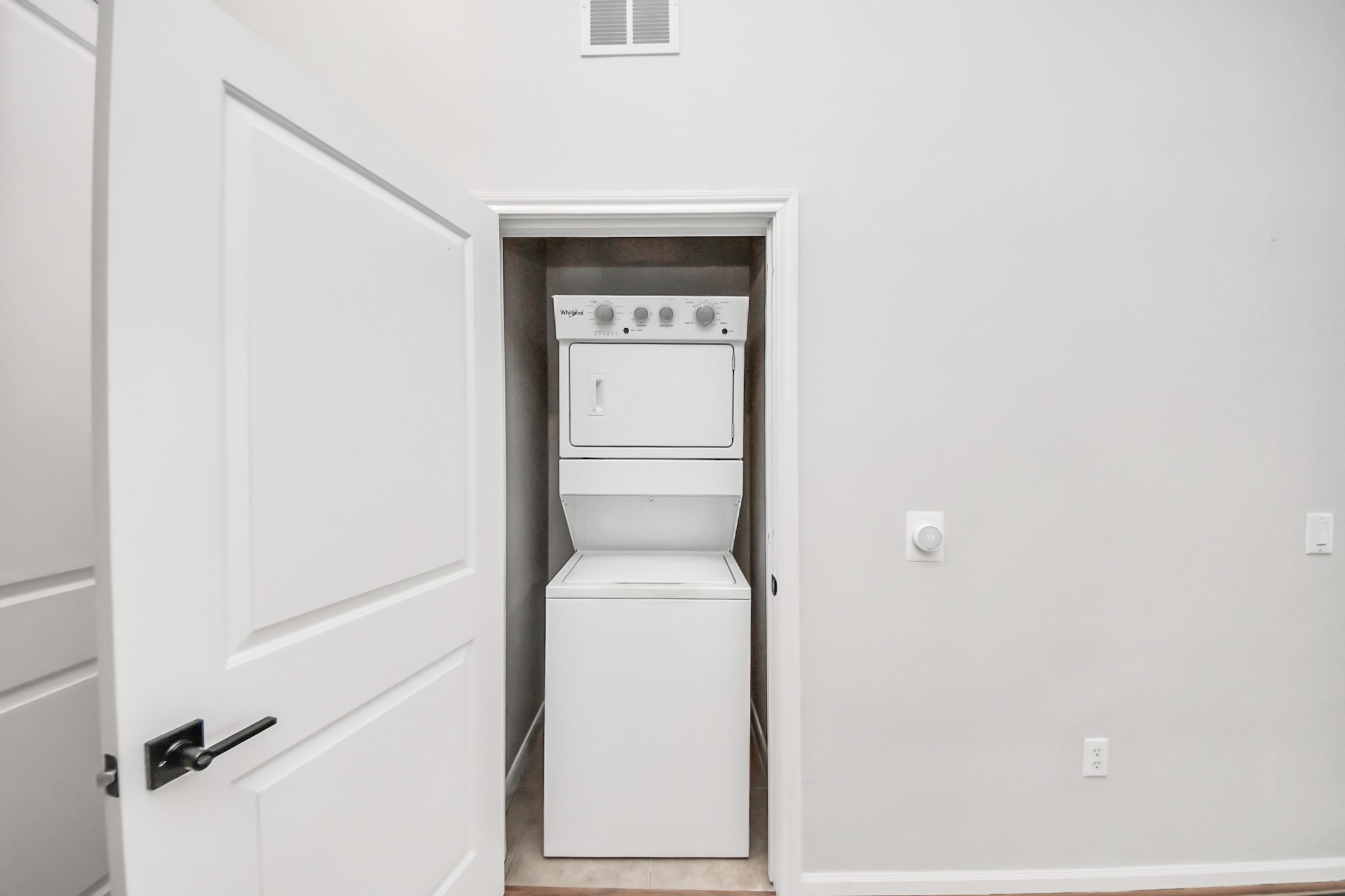 6363 San Felipe Street, Unit 562 Houston, TX 77057 - Photo 26 of 43 a utility room with a washer and dryer