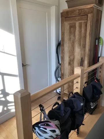 a view of living room with furniture and a flat screen tv
