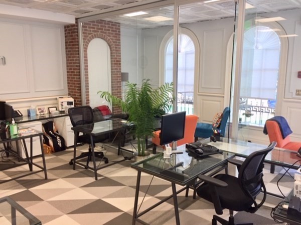292 Beacon Street, Unit 1 2 Somerville, MA 02143 - Photo 2 of 27 a view of a livingroom with furniture and a window