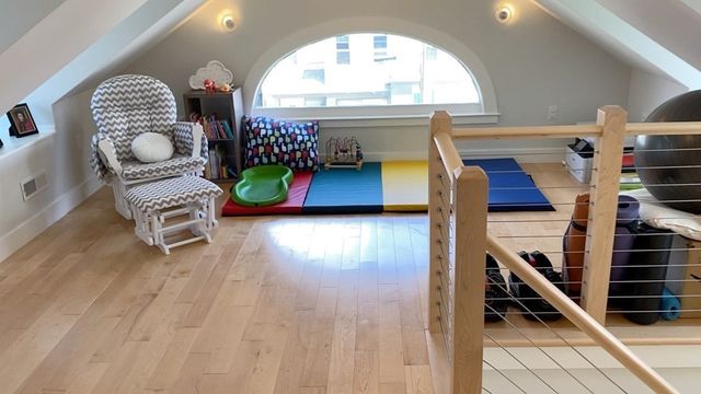 a view of a livingroom with furniture and wooden floor