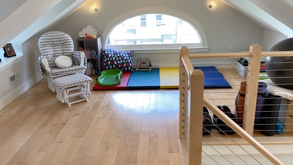 292 Beacon Street, Unit 1 2 Somerville, MA 02143 - Photo 22 of 27 a view of an entryway with wooden floor