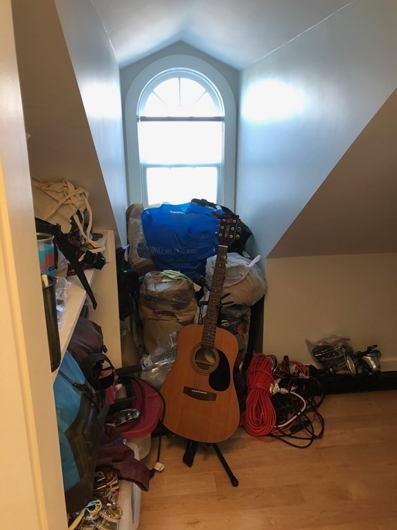 292 Beacon Street, Unit 1 2 Somerville, MA 02143 - Photo 24 of 27 a room with gym equipment