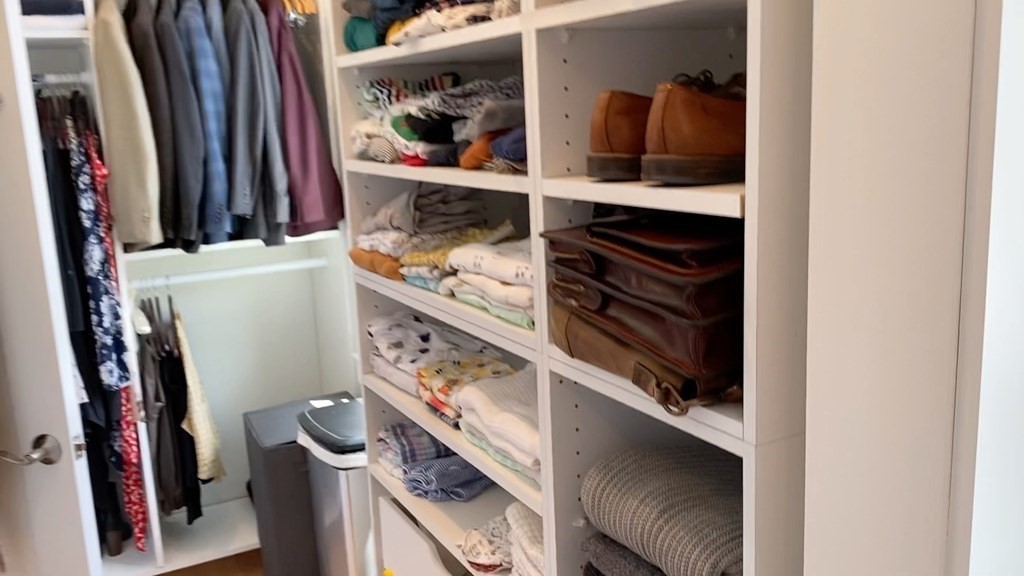 292 Beacon Street, Unit 1 2 Somerville, MA 02143 - Photo 25 of 27 a view of walk in closet with clothes and shoes