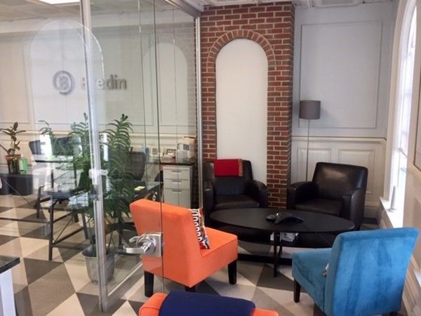 a living room with patio furniture