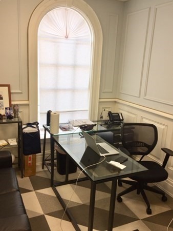 292 Beacon Street, Unit 1 2 Somerville, MA 02143 - Photo 9 of 27 a view of a dining room with furniture and a window