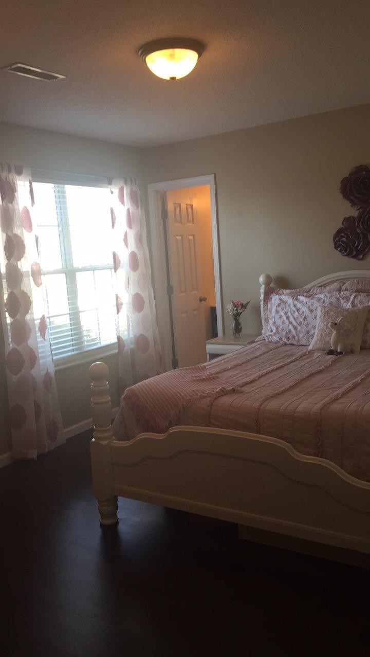7557 Gary White Road Corryton, TN 37721 - Photo 12 of 23 a bedroom with a bed and window