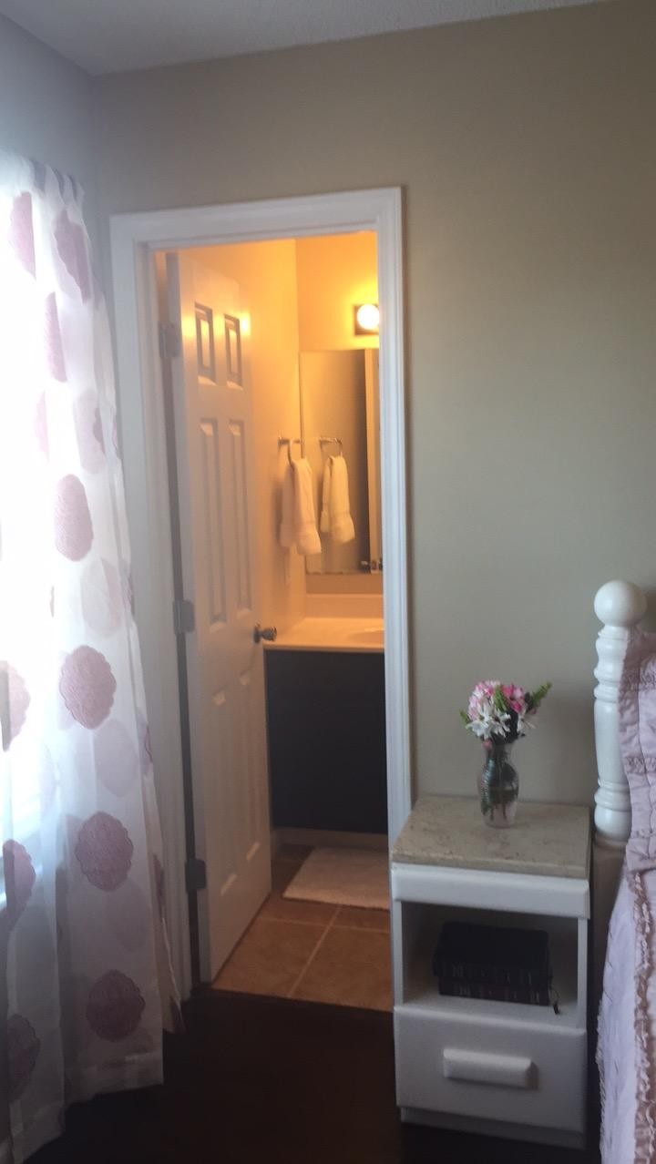 7557 Gary White Road Corryton, TN 37721 - Photo 16 of 23 a view of bathroom with a shower and a sink