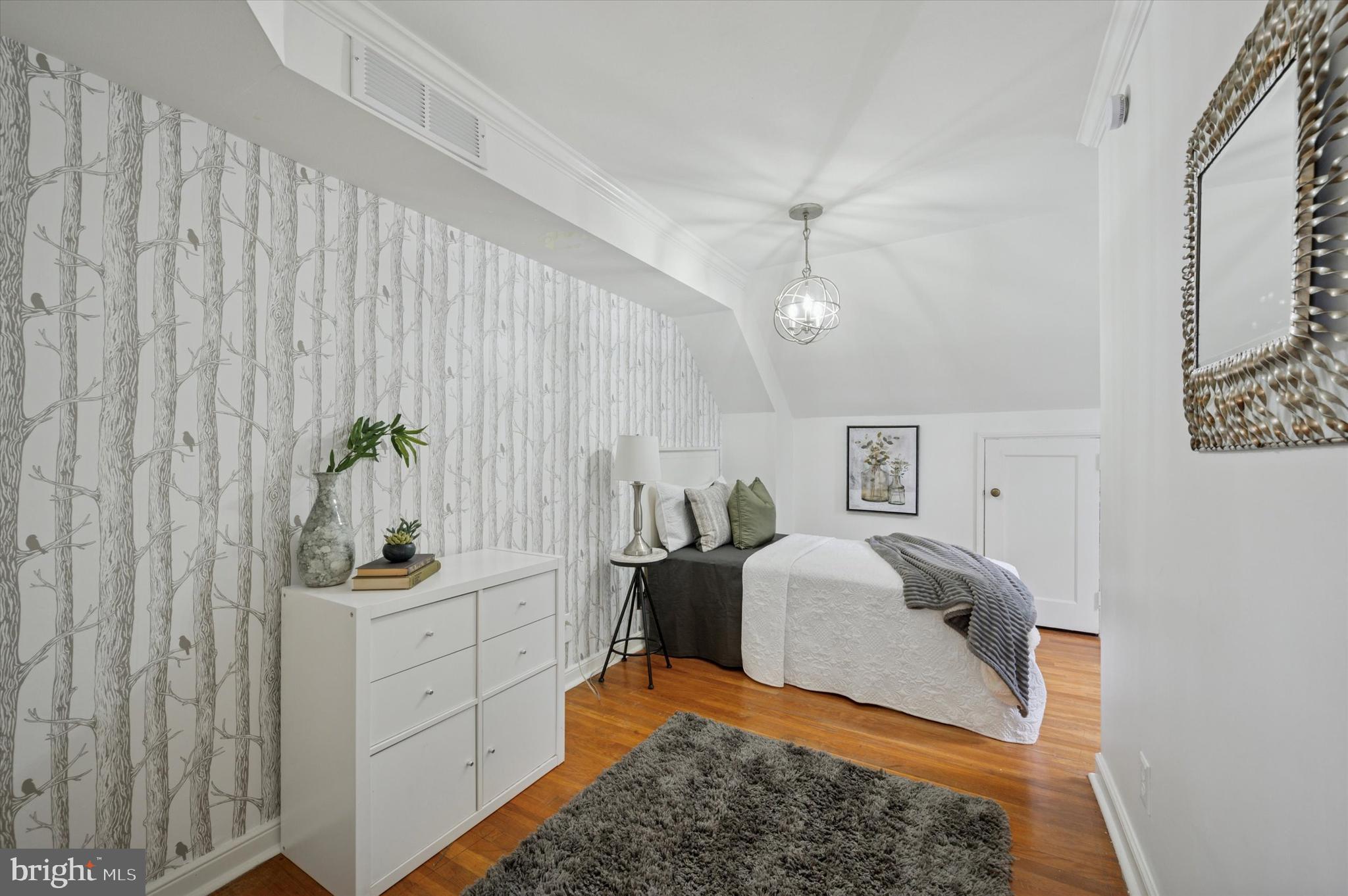 12 Rodney Road Bryn Mawr, PA 19010 - Photo 17 of 25 a bedroom with a bed and a cabinets