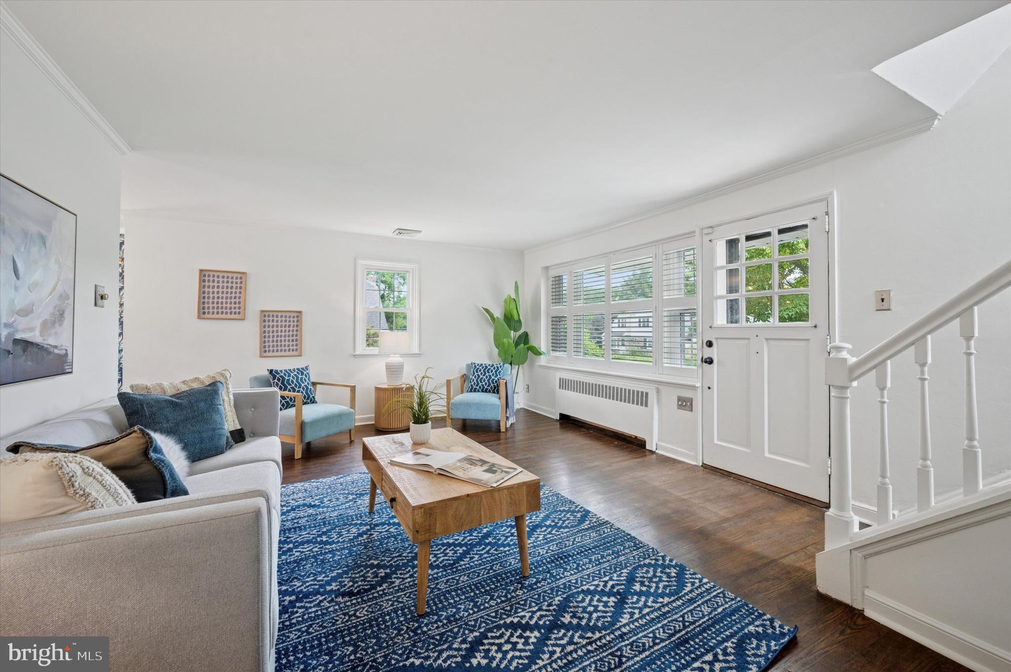 12 Rodney Road Bryn Mawr, PA 19010 - Photo 4 of 25 a living room with furniture a rug and a window