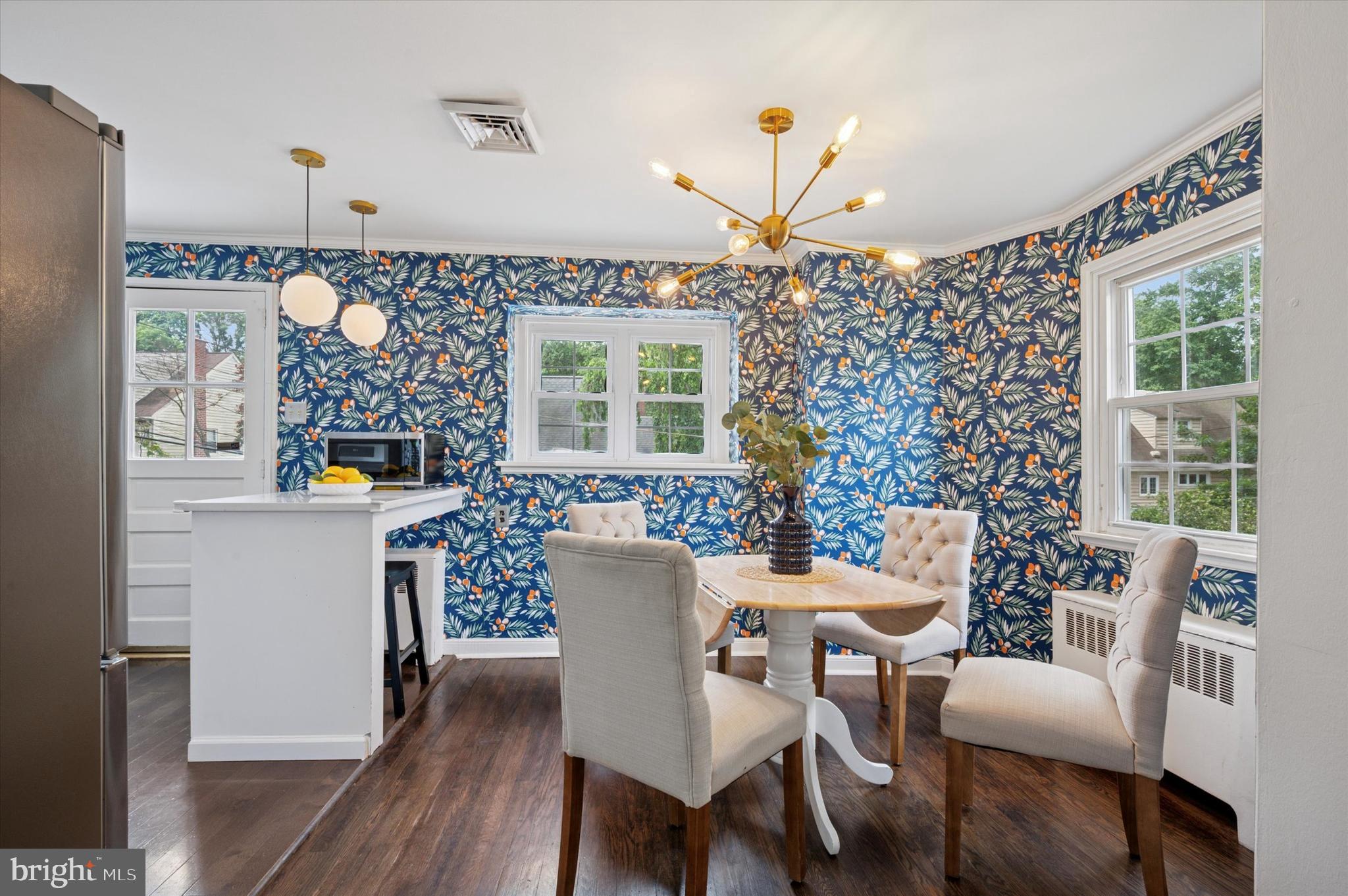 12 Rodney Road Bryn Mawr, PA 19010 - Photo 6 of 25 a view of a dining room with furniture window and wooden floor