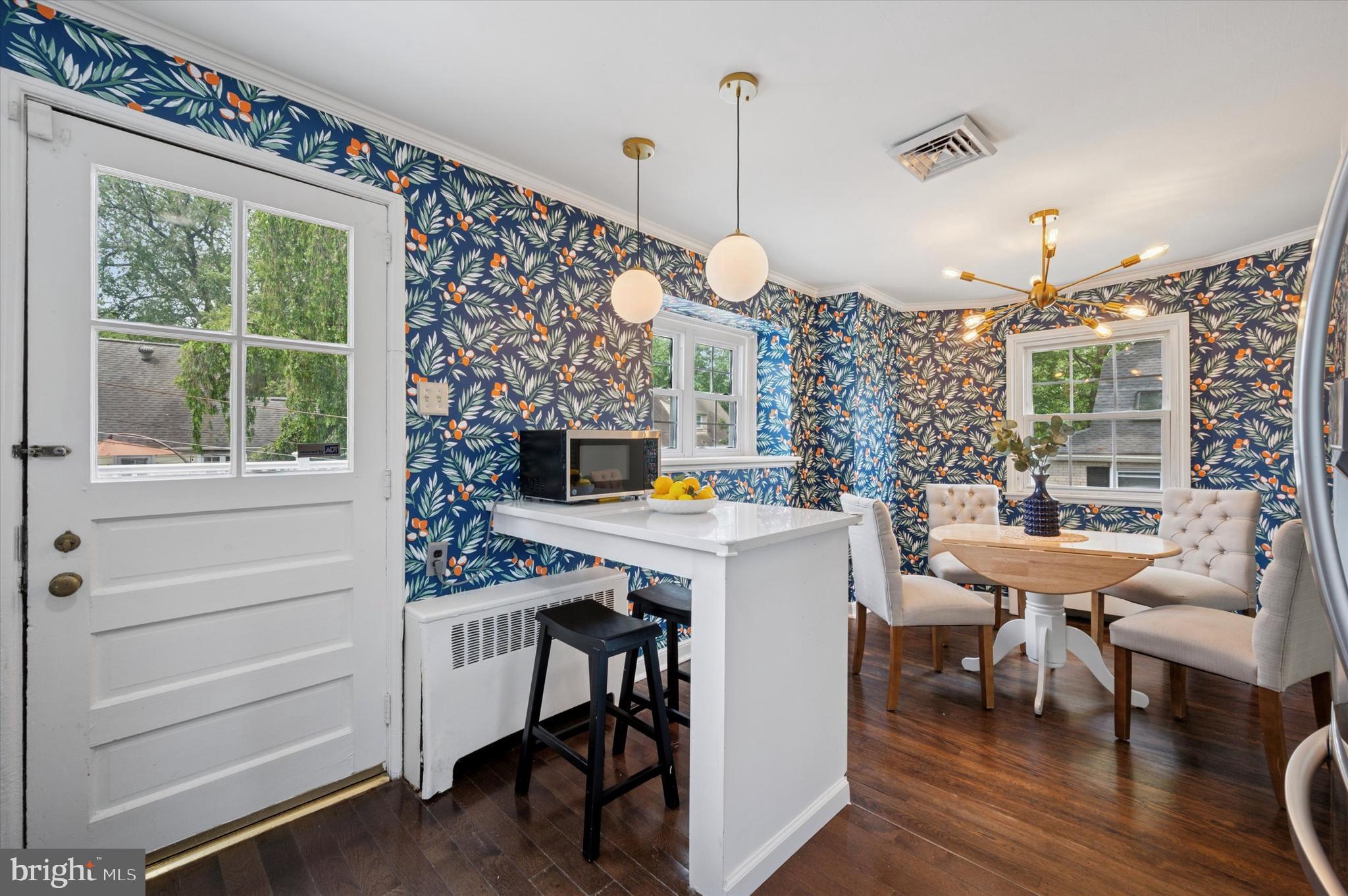 12 Rodney Road Bryn Mawr, PA 19010 - Photo 10 of 25 a view of a dining room with furniture window and wooden floor