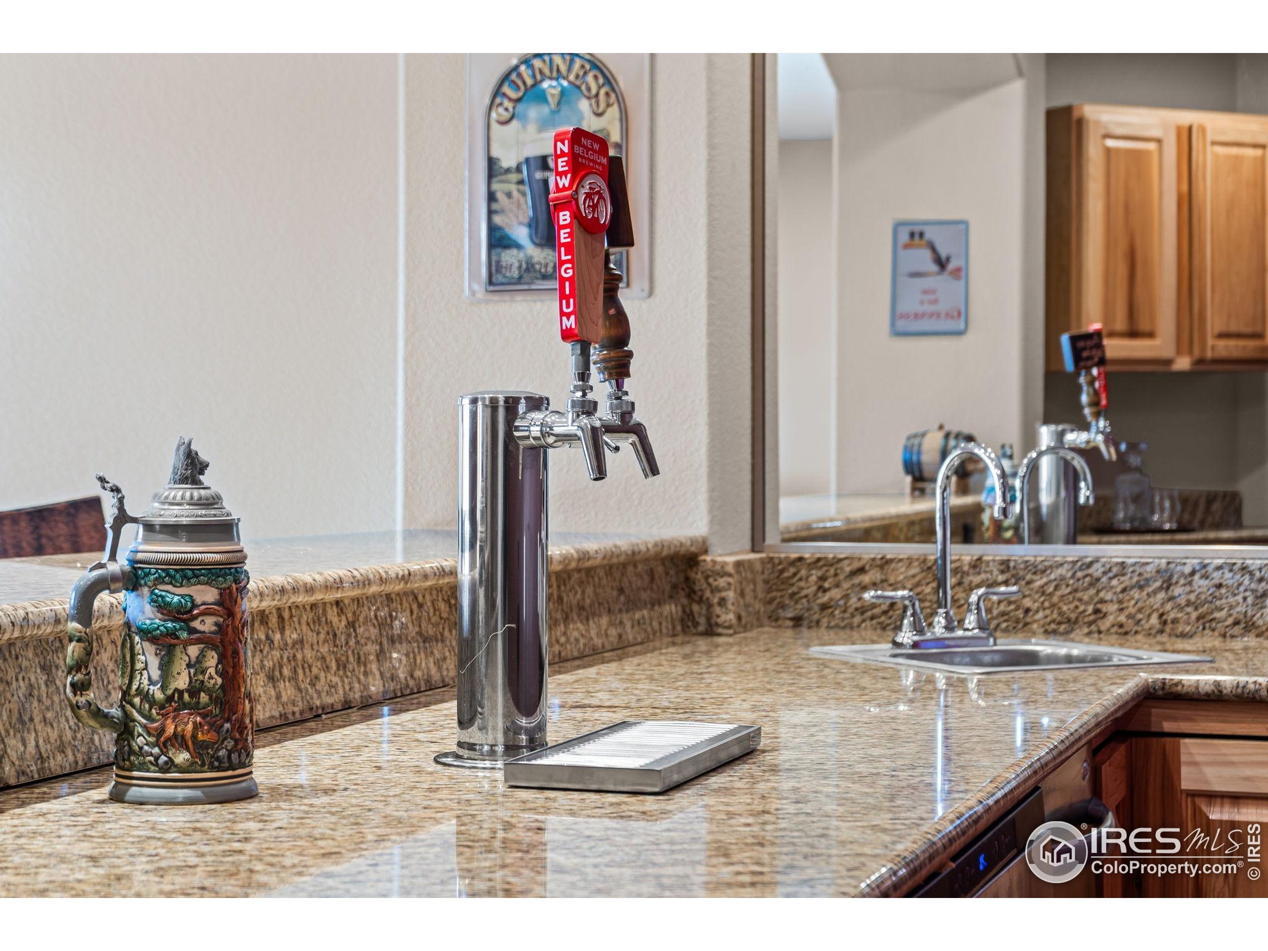 621 Roma Valley Drive Fort Collins, CO 80525 - Photo 41 of 50 a bathroom with a sink and a mirror