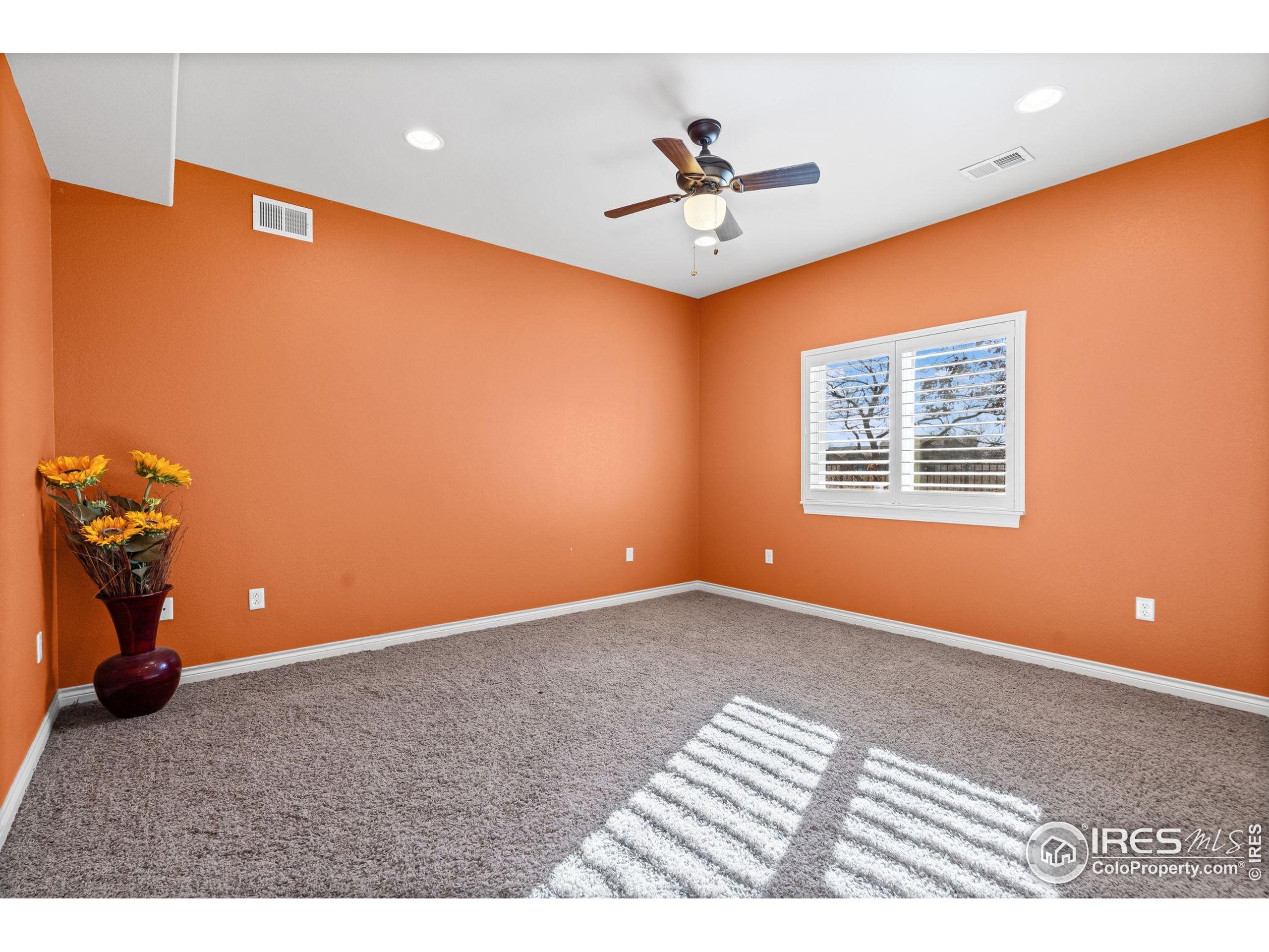 621 Roma Valley Drive Fort Collins, CO 80525 - Photo 43 of 50 a view of an empty room with a window
