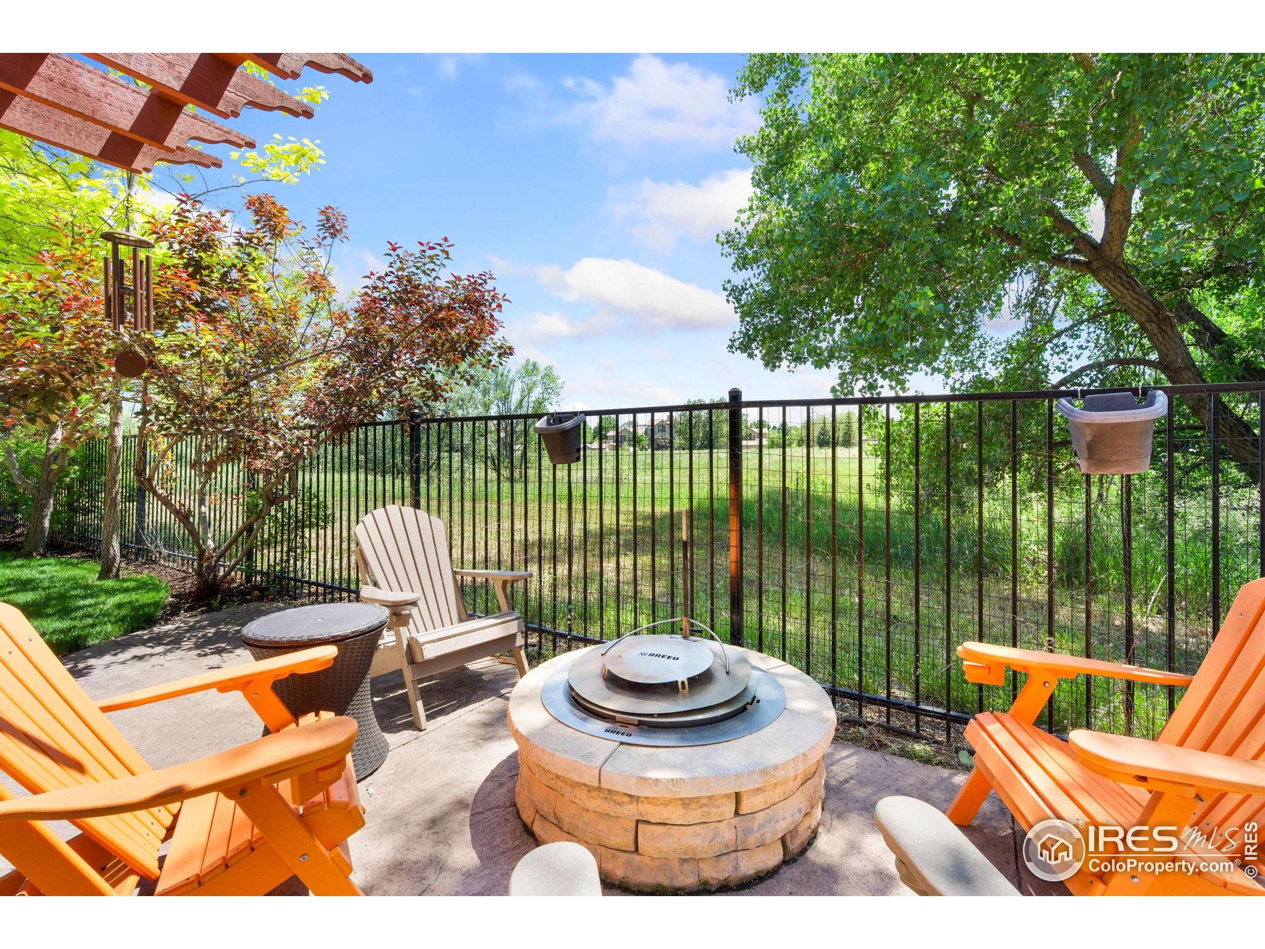 621 Roma Valley Drive Fort Collins, CO 80525 - Photo 48 of 50 a view of a balcony with outdoor seating