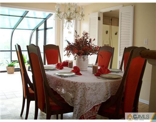 811 New Dover Road Edison, NJ 08820 - Photo 4 of 11 a dining room with furniture and window