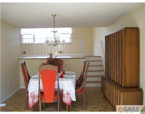 811 New Dover Road Edison, NJ 08820 - Photo 6 of 11 a view of a dining room with furniture window and outside view