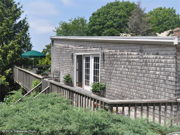35 West Main Road Little Compton, RI 02837 - Photo 17 of 30 a view of a balcony with a wooden fence