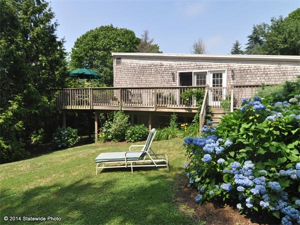 35 West Main Road Little Compton, RI 02837 - Photo 18 of 30 a house view with a garden space