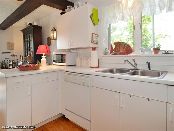 35 West Main Road Little Compton, RI 02837 - Photo 6 of 30 a kitchen with sink and window