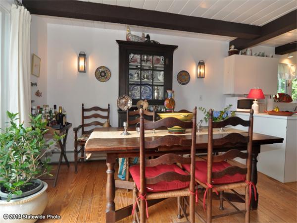 35 West Main Road Little Compton, RI 02837 - Photo 8 of 30 a view of a dining room with furniture and wooden floor