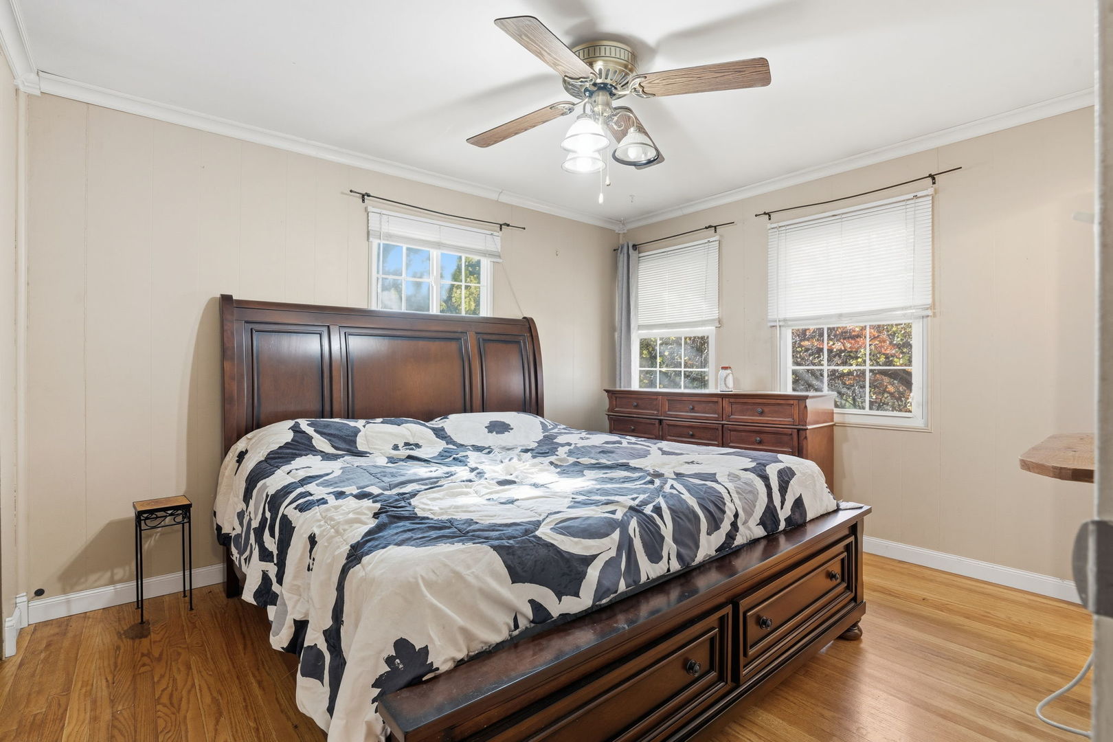 3900 28th Street Rock Island, IL 61201 - Photo 12 of 27 a bedroom with a bed and wooden floor