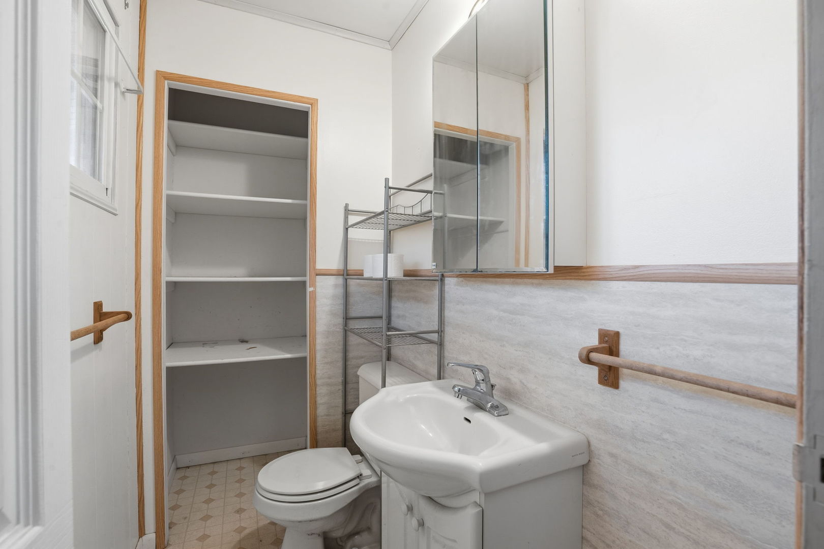 3900 28th Street Rock Island, IL 61201 - Photo 14 of 27 a bathroom with a sink toilet and a mirror