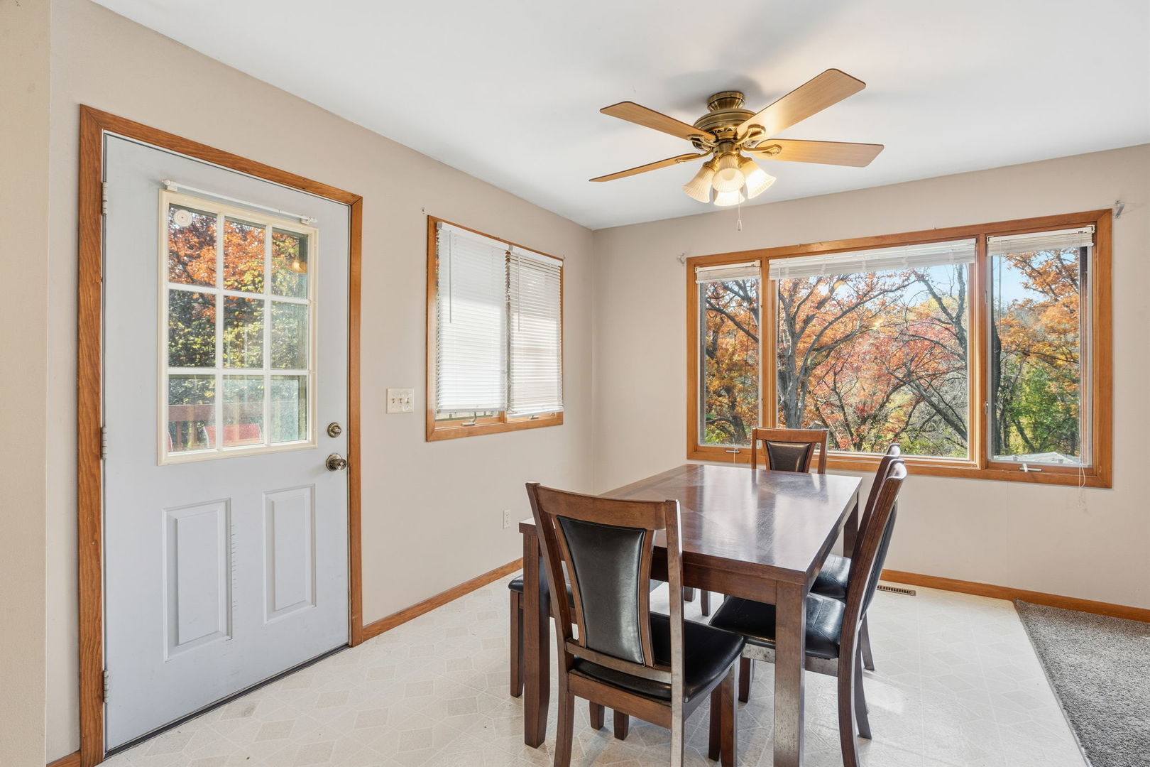 3900 28th Street Rock Island, IL 61201 - Photo 9 of 27 a view of a dining room with furniture window and outside view