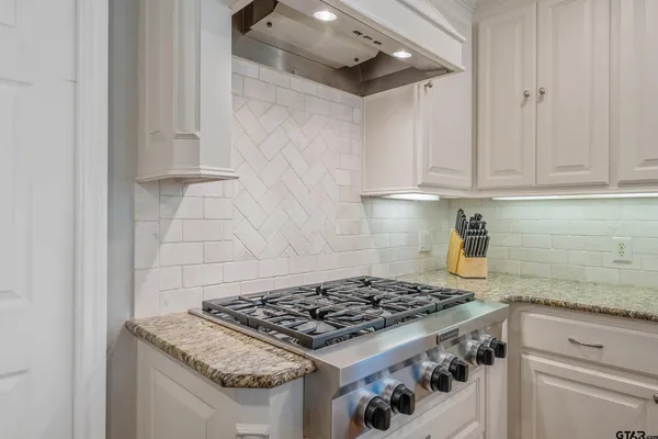 a view of kitchen with furniture and wooden floor