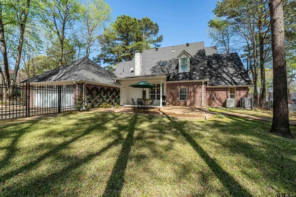 a view of a house with a swimming pool