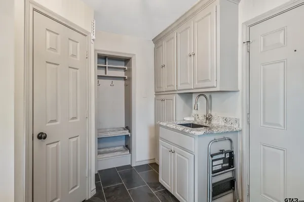 a swimming pool with outdoor seating and yard