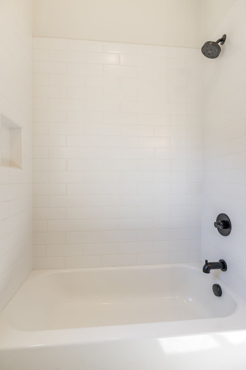 9011 Safehaven Place Spring Hill, TN 37174 - Photo 47 of 84 a bathroom with a bathtub