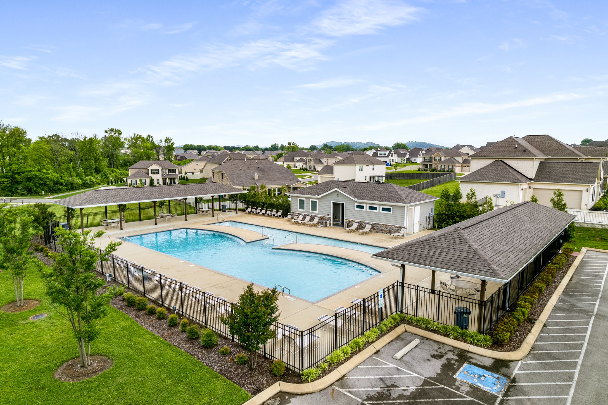 9011 Safehaven Place Spring Hill, TN 37174 - Photo 83 of 84 an aerial view of houses with a swimming pool