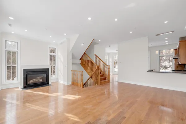 an entryway and livingroom with furniture