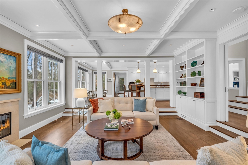 403 Simon Willard Road Concord, MA 01742 - Photo 12 of 42 a living room with furniture and a large window