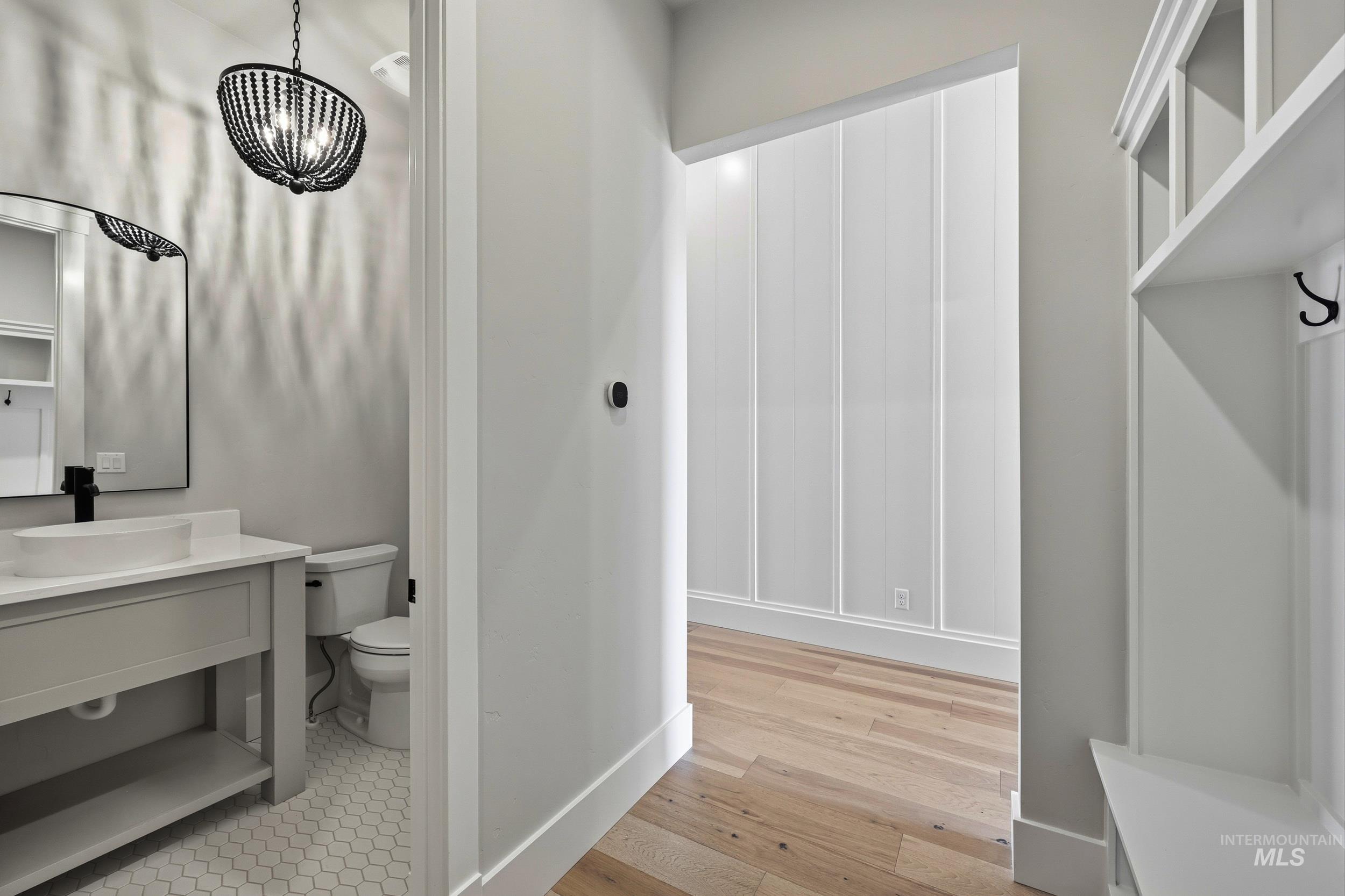 1048 East Escalation Street Meridian, ID 83642 - Photo 28 of 44 Mudroom featuring a sink and light wood-style floors