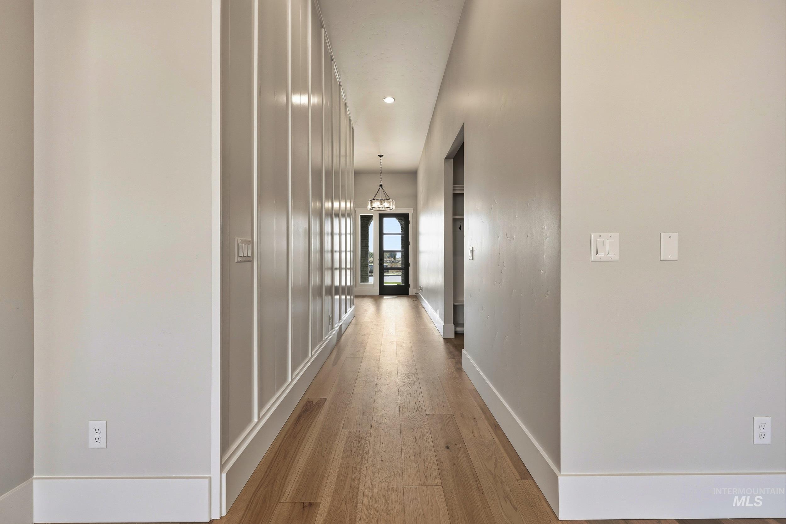 1048 East Escalation Street Meridian, ID 83642 - Photo 30 of 44 Corridor with light wood-style flooring and recessed lighting