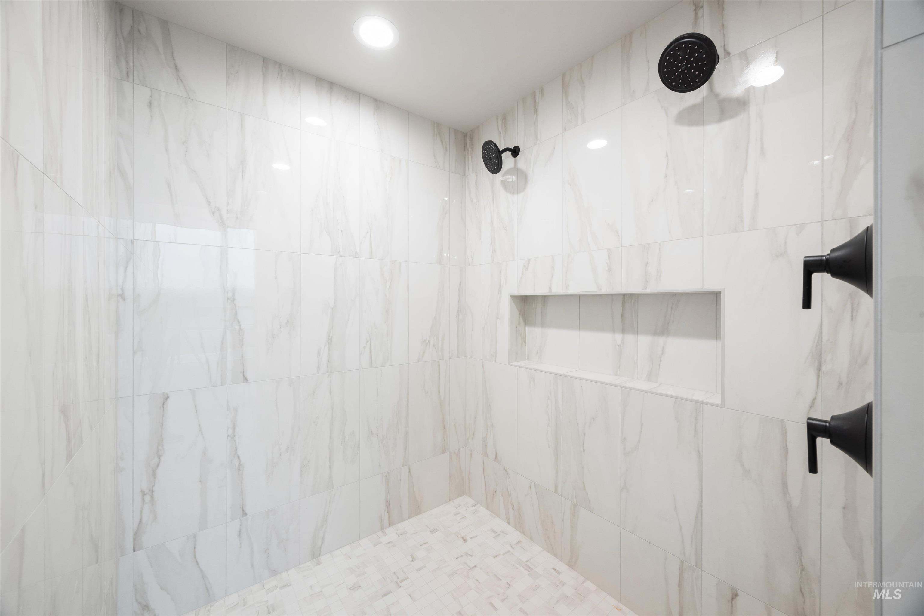 1048 East Escalation Street Meridian, ID 83642 - Photo 31 of 44 Full bathroom with tiled shower and recessed lighting