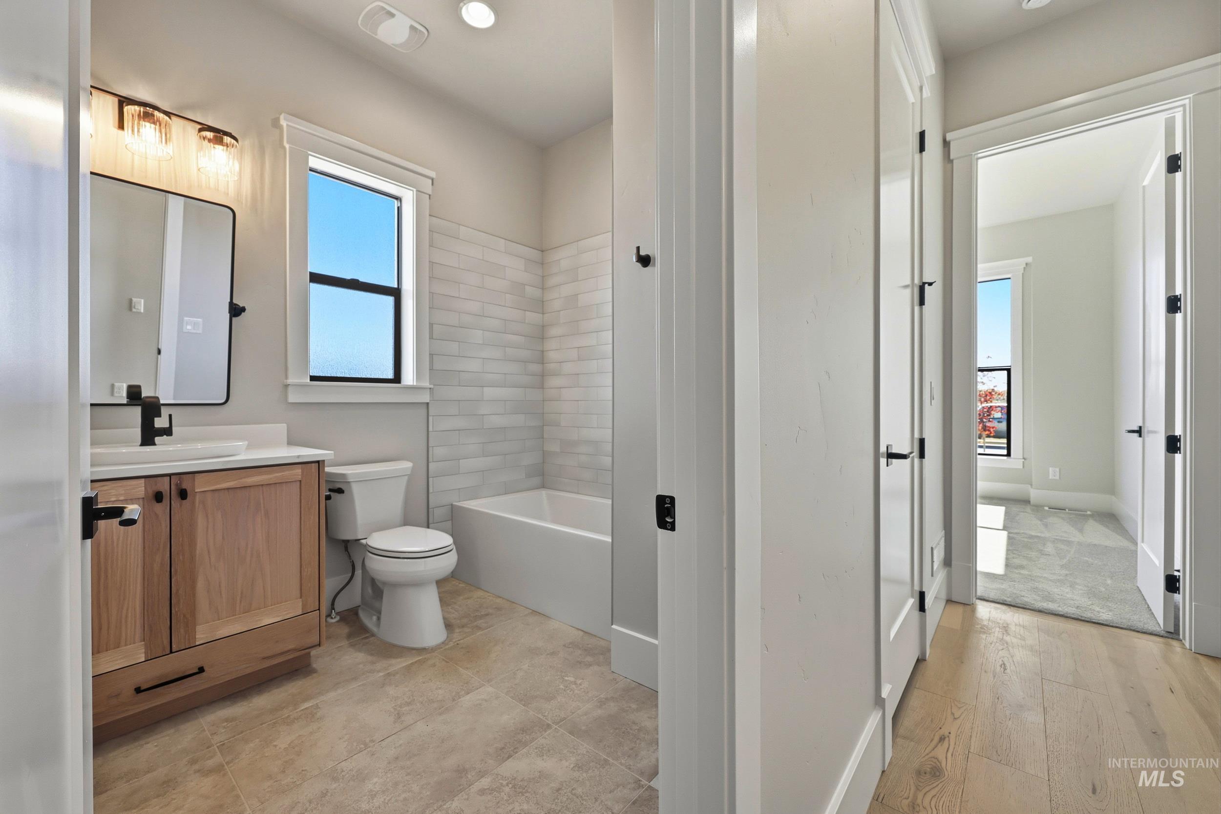 1048 East Escalation Street Meridian, ID 83642 - Photo 34 of 44 Full bathroom featuring vanity and toilet