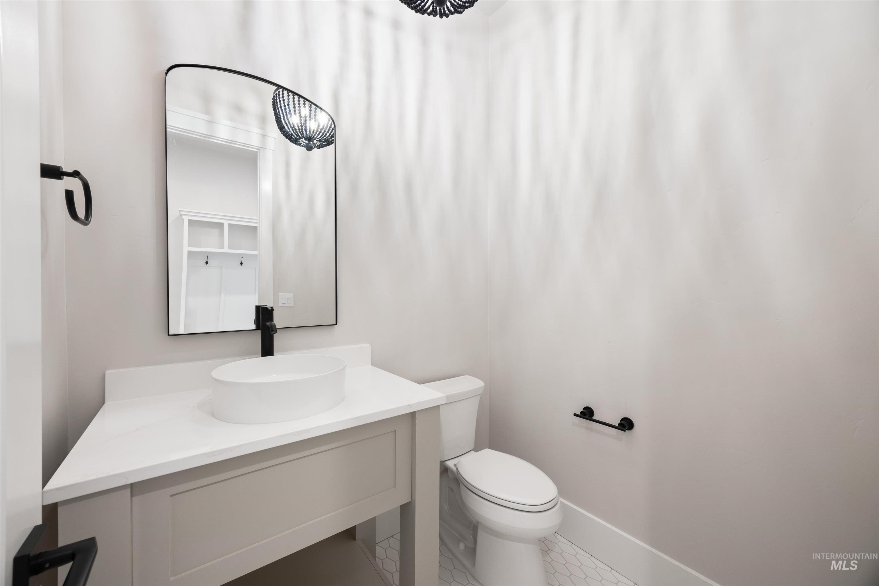 1048 East Escalation Street Meridian, ID 83642 - Photo 36 of 44 Bathroom featuring vanity and toilet