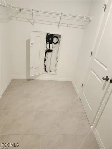 a view of a room with racks on the wall