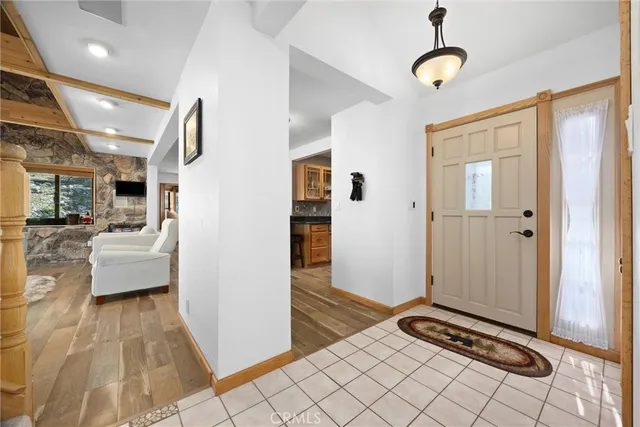 a bedroom with a bed and a desk