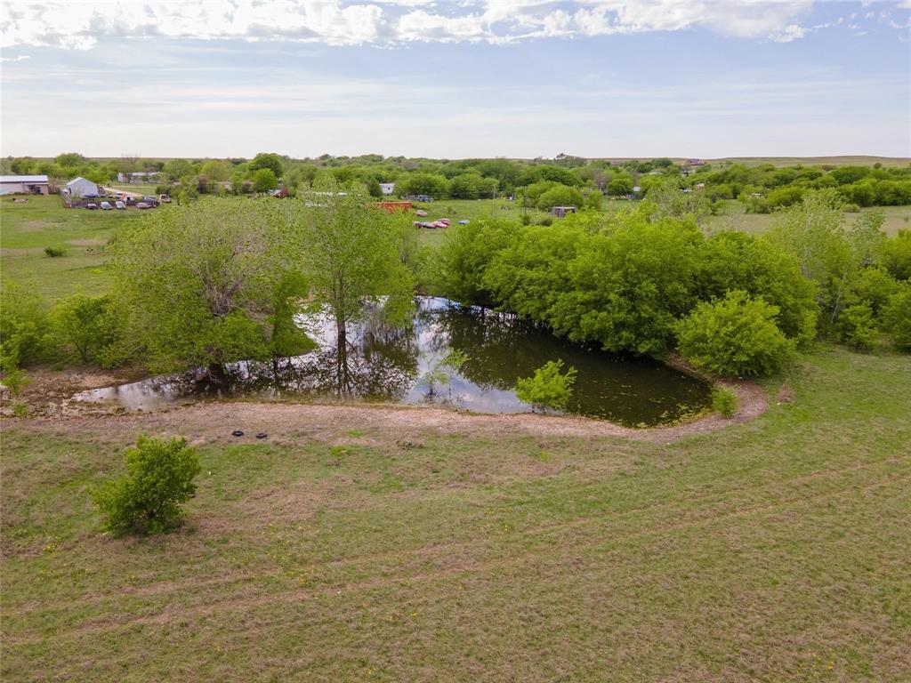 6156 Sky Road Crowley, TX 76036 - Photo 2 of 23 a view of a lake with a yard