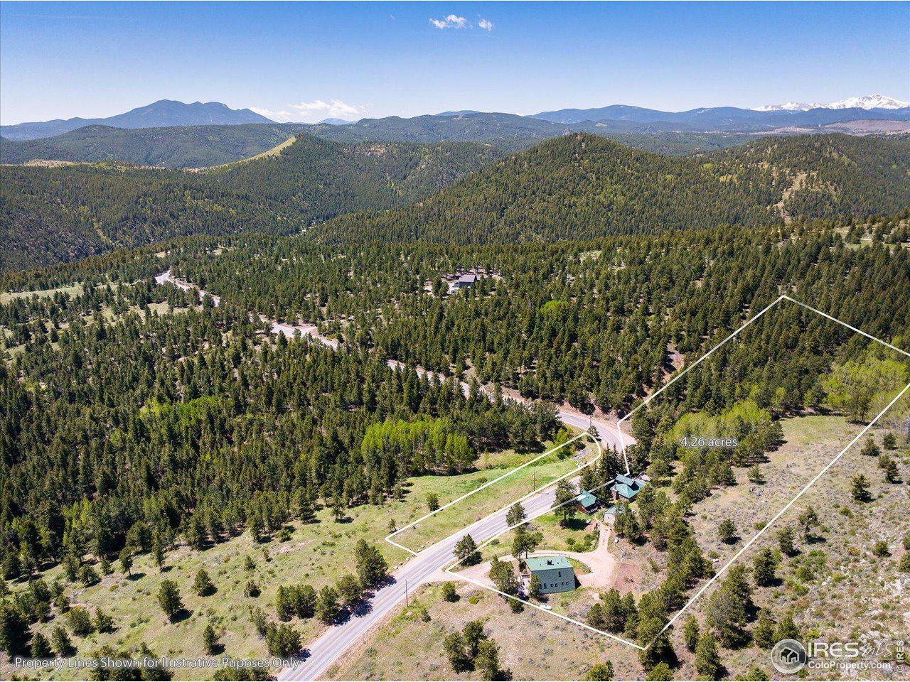 5690 Sugarloaf Road Boulder, CO 80302 - Photo 25 of 27 a view of a mountain with a forest